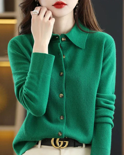 Layering a camel polo-collar merino cardigan, fine 19-micron knit wicks moisture and blocks chill on breezy travel days.