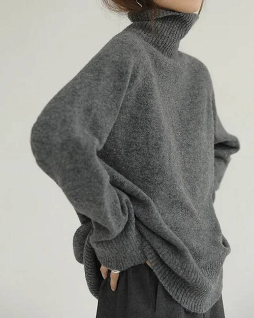 Wool loose turtleneck sweater, oversized drop shoulders, ribbed neck & cuffs, heather taupe—breathable warmth for winter layering.