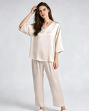Featuring a V-neckline, three-quarter sleeves, and elastic waist trousers — breathable, elegant, and crafted for lasting comfort. 