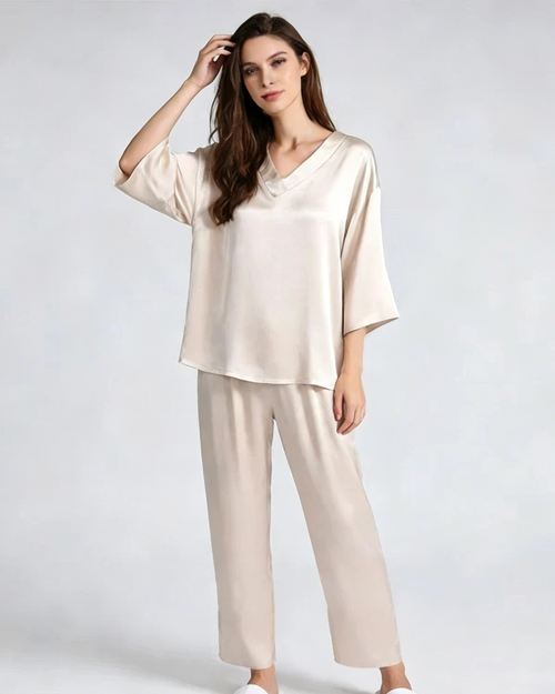 Featuring a V-neckline, three-quarter sleeves, and elastic waist trousers — breathable, elegant, and crafted for lasting comfort. 