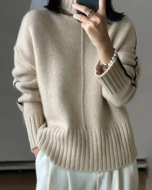 Soft cashmere-wool blend turtleneck sweater, ribbed knit, relaxed fit, heather taupe—lightweight warmth for winter commutes or weekend layering.