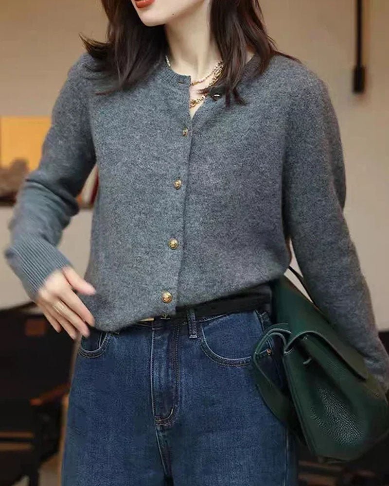 Woman brunching in a Crewneck 100 % Cashmere Short Cardigan, 19-micron Mongolian fibers and boxy cropped cut hit just above high-rise jeans—your luxe yet breathable 60-75 °F spring-fall statement.