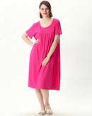 Plus size cotton and viscose knit sleep dress with a round neckline and short sleeves. Relaxed knee-length fit — soft, breathable & easy to wear all summer.