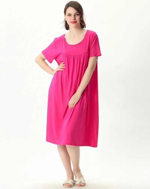 Plus size cotton and viscose knit sleep dress with a round neckline and short sleeves. Relaxed knee-length fit — soft, breathable & easy to wear all summer.