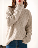 Gentle Herd slouchy wool turtleneck sweater, oversized silhouette, rolled neck, ribbed cuffs, heather taupe—cloud-soft warmth for winter layering or solo wear.