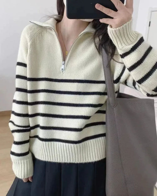 Woman brunching in a Half-Zipper Striped Pure Cashmere Pullover, 19-micron Mongolian fibers and two-tone nautical stripes give luxe polish—your breathable 60-75 °F spring-fall staple.