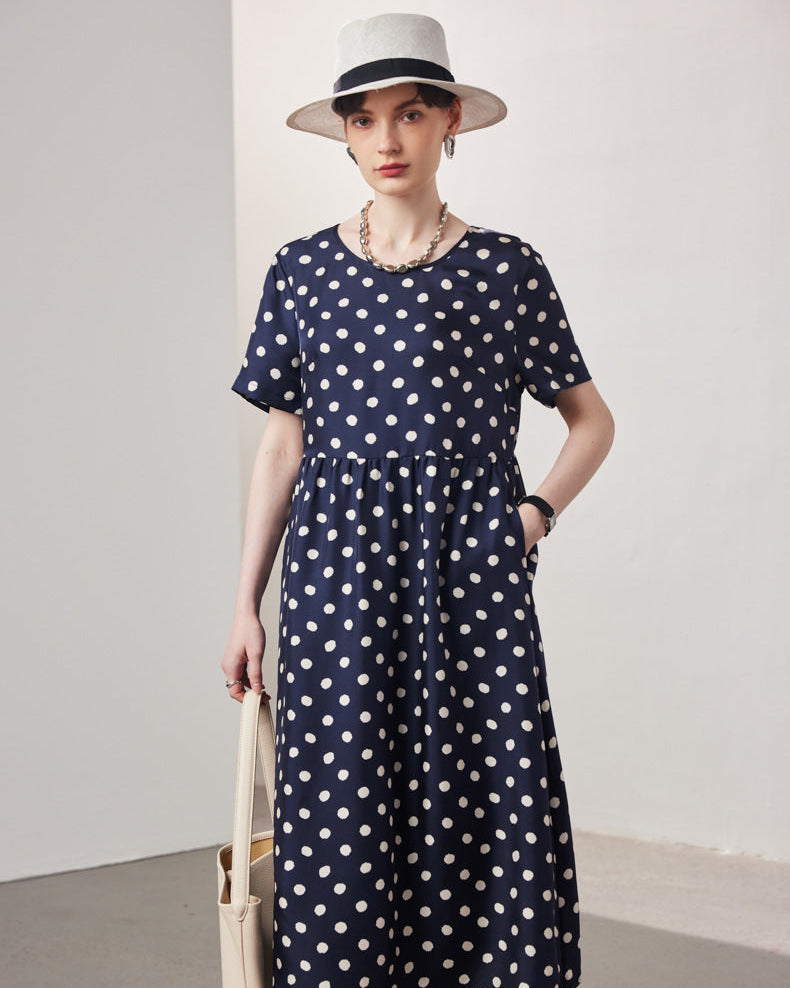 Of a women's  Spring and Summer short-sleeved silk dress featuring a classic doll collar and a soft twill texture, designed with a loose fit for plus-size comfort.