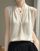 Women's French style loose V-neck knitted vest made of lightweight worsted wool featuring a sleeveless design and a comfortable temperament fit.