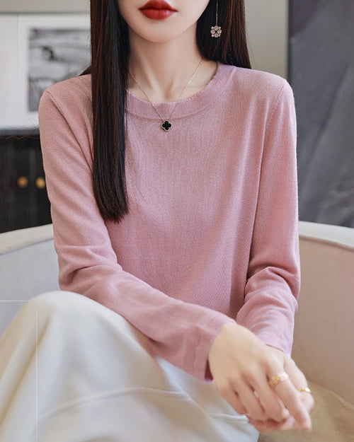 Women's oversized loose-fit sweater made from a soft lightweight wool blend, perfect for layering.