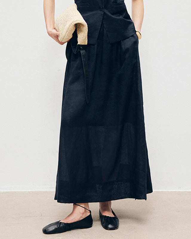 Women's loose-fit linen skirt made from breathable and featuring side slits, offering a comfortable silhouette perfect for summer fashion.