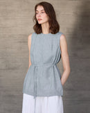 Elevate your warm-weather wardrobe with our linen drawstring waist tank. Lightweight, breathable, and effortlessly chic, perfect for brunch, beach days, and layered styling. 