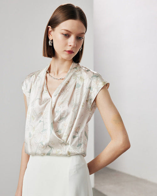 Front view of a loose-fit printed silk shirt with wide straps and a flattering V-neck cut, crafted from breathable mulberry silk for a chic summer wardrobe essential.
