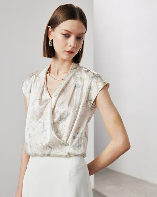 Front view of a loose-fit printed silk shirt with wide straps and a flattering V-neck cut, crafted from breathable mulberry silk for a chic summer wardrobe essential.