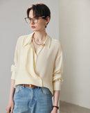 Women's long sleeve sand washed silk shirt in a solid neutral tone, featuring a matte texture and soft drape, perfect for Spring and Summer office wear.