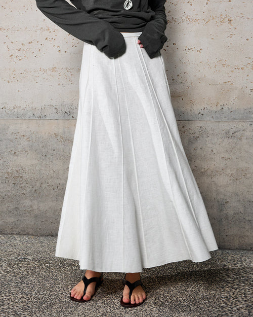 Women's high-waisted structured panel A-line skirt made from premium [Material] and a tailored silhouette perfect for office wear.
