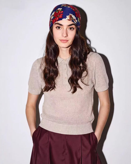 Relaxed women's short-sleeve knit top made from premium cashmere wool blend featuring a classic hollow polo collar and loose fit for a sophisticated look.