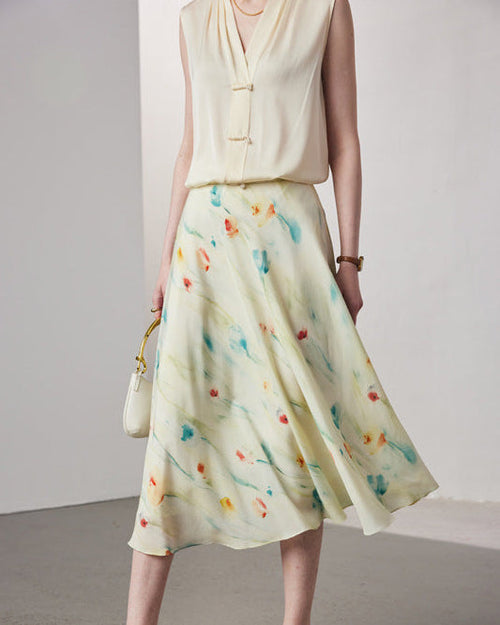 Women's crepe print silk midi skirt featuring a design on luxurious and a flowy silhouette perfect for spring and summer fashion.
