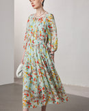 Women's summer mulberry silk two-piece dress featuring a micro-transparent floral print and seven-quarter length sleeves for a breezy layered look.