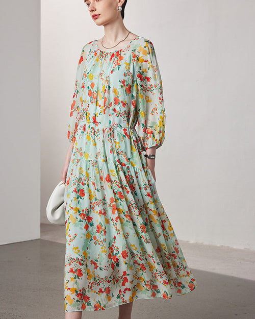 Women's summer mulberry silk two-piece dress featuring a micro-transparent floral print and seven-quarter length sleeves for a breezy layered look.