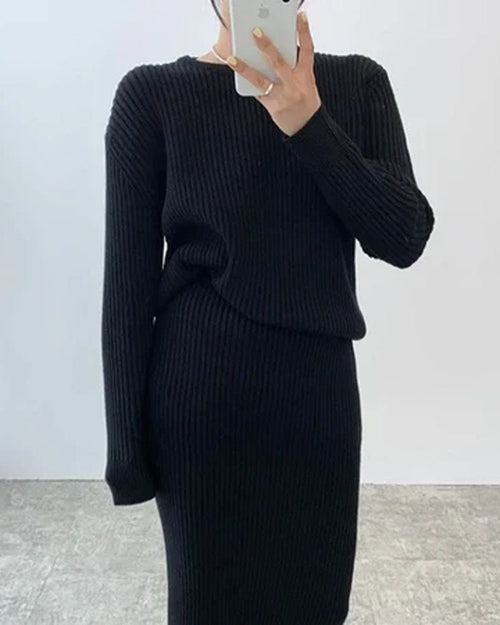 Woman brunching in a Ribbed Knitted Round-Neck Sweater & Midi Skirt Set, airy 55 % viscose / 45 % polyester rib drapes like jersey—your cozy yet polished 60-75 °F spring-fall statement.