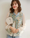 Lightweight polyester elegant jacquard floral round neck button vest with contrast color accents and a sleeveless silhouette, perfect for polished office wear or spring summer casual outfits.