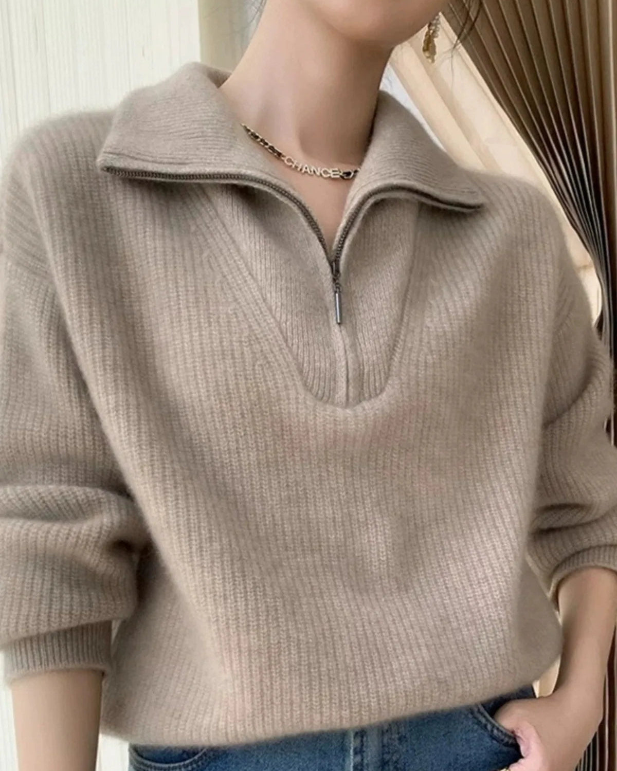Oversized Cashmere Pullover, large fold-over lapel, asymmetrical two-way zip, midi length, deep-sea navy—runway-ready winter layer that belts over denim or leggings.
