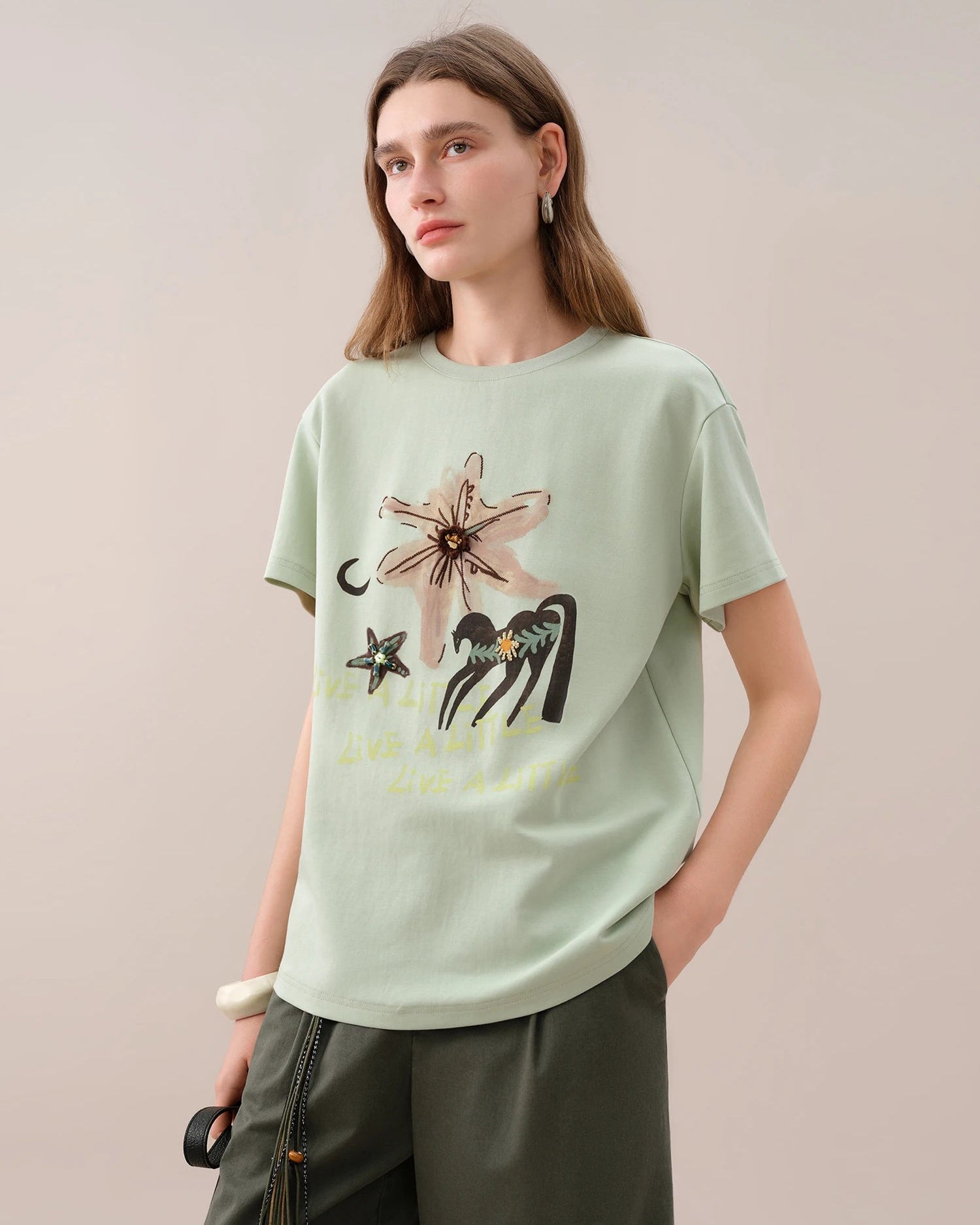 Oversized cotton-nylon floral tee with round neck & medium stretch. Lightweight, breathable & effortlessly casual for summer days and office wear.