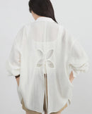 Loose-Fitting Long-Sleeved Shirt With Open Back