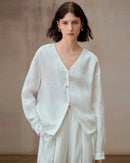 Linen V-neck button-up shirt, loose longline silhouette with full sleeves. Effortless streetwear-to-office style for spring & summer.