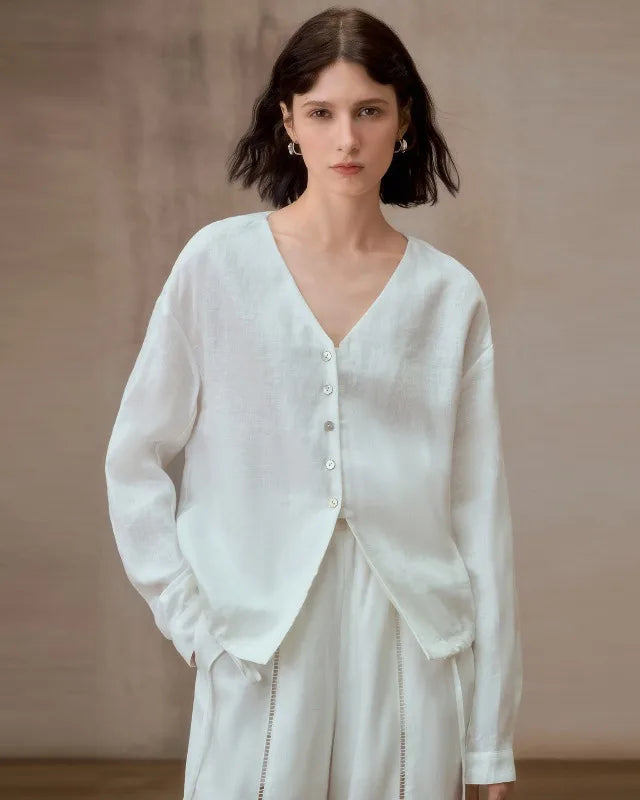 Linen V-neck button-up shirt, loose longline silhouette with full sleeves. Effortless streetwear-to-office style for spring & summer.