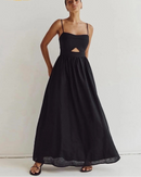 Cotton slash-neck sleeveless maxi dress with hollow-out detail. Relaxed A-line silhouette in 5 colours — breathable and effortlessly elegant for summer.