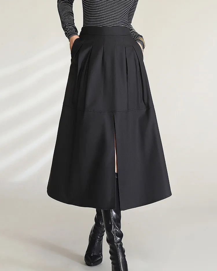 Elegant polyester viscose blend high-waisted belted pocket A-line slit skirt with a soft drape and midi length, perfect for polished office wear or casual autumn everyday outfits in black.