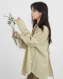 Loose-Fitting Long-Sleeved Shirt With Open Back
