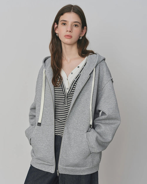 Premium loose fitting drop-shoulder hooded sweatshirt crafted for a cozy fit, offering a modern silhouette and versatile comfort for your lounging needs or daily activities.