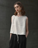 Linen sleeveless crop top — breathable, relaxed fit, perfect for summer. Available in multiple colors. 
