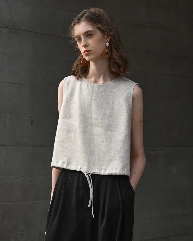 Linen sleeveless crop top — breathable, relaxed fit, perfect for summer. Available in multiple colors. 
