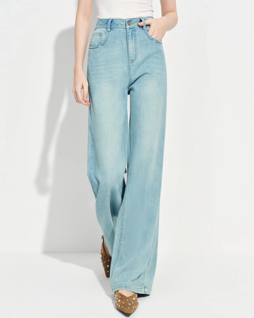 Premium loose-fitting high-waisted straight-leg jeans crafted from a breathable cotton blend, offering medium stretch and a minimal design for effortless spring style.