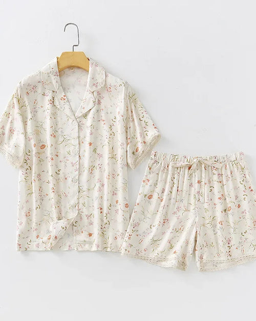 Women's Beige satin-like viscose short sleeve shirt and shorts pajama set featuring a delicate willow print, lapel collar, and silky smooth fabric, perfect for cool summer loungewear comfort.
