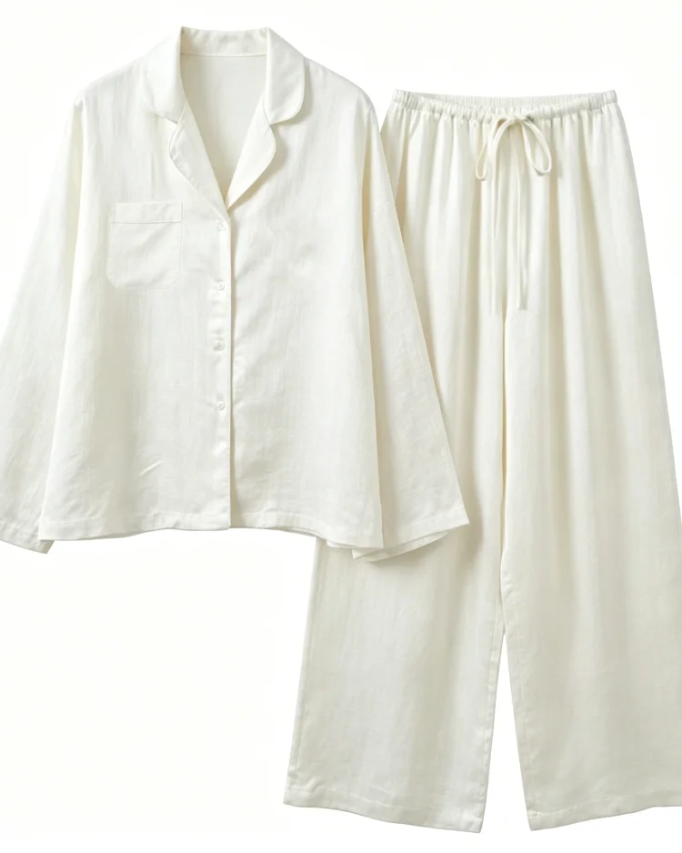 Our puff sleeve oversized shirt two-piece set featuring a turn-down collar top and elastic waist trousers. A relaxed, high-street co-ord designed.