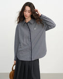 Women's blue collegiate plaid loose shirt with classic collar, featuring lightweight woven polyester fabric and relaxed drape for spring casual wear or autumn layering.