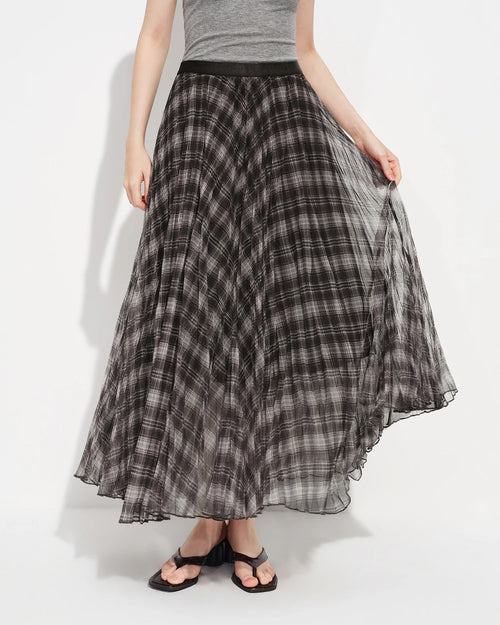 Soft to the touch yet structured in silhouette, this vintage-inspired skirt offers the perfect balance between ease and elegance.
