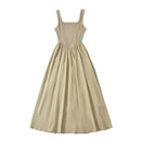 Ruched empire waist midi dress — sleeveless A-line jersey knit with vintage-inspired pleating. Effortless warm-weather style, all-day comfort.
