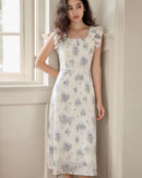Women's lavender printed square neck fitted waist dress, featuring breathable polyester fabric and flying sleeves for summer prairie chic or weekend getaway elegance.
