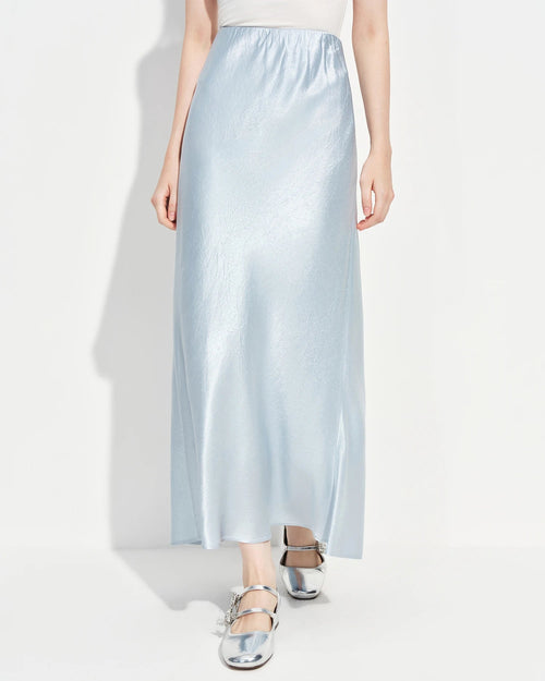 Women's acetate trumpet ankle skirt in champagne, empire waist, silk-like drape, elegant spring occasion wear.