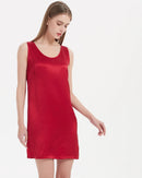 100% mulberry silk round neck sleeveless mini dress with A-line silhouette. Lightweight, fluid summer style in 7 solid colours, sizes S–XXL.