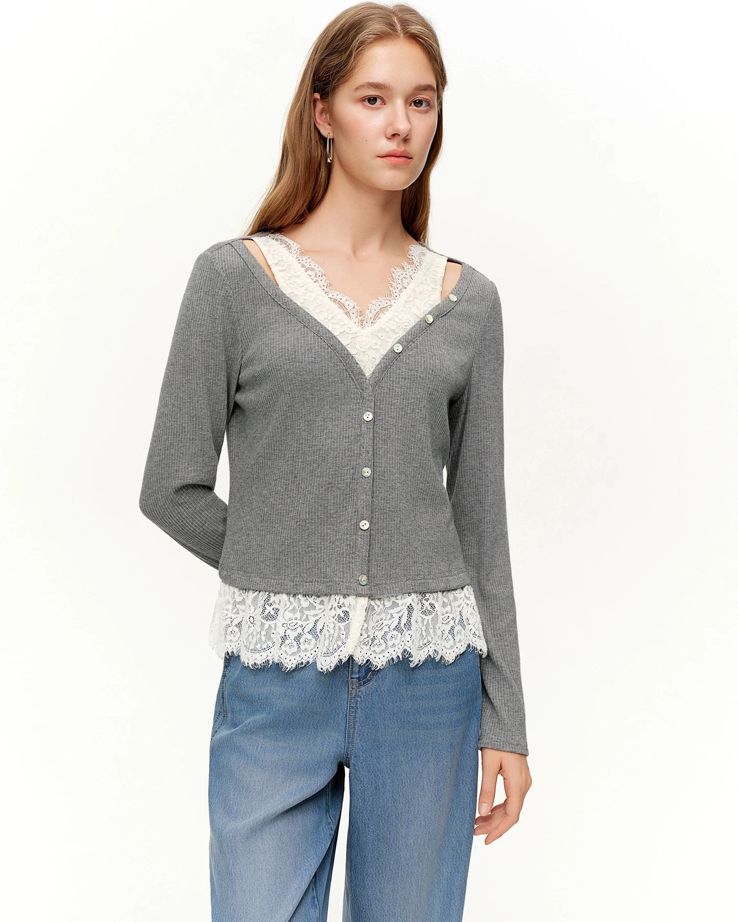 Elegant lace V-neck knit top for women. Soft stretch fabric, regular fit, full sleeves.