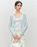 Women's lace-trimmed knit cardigan, featuring a smooth polyester-nylon blend and delicate lace trim for effortless French-inspired morning errands or evening outings.