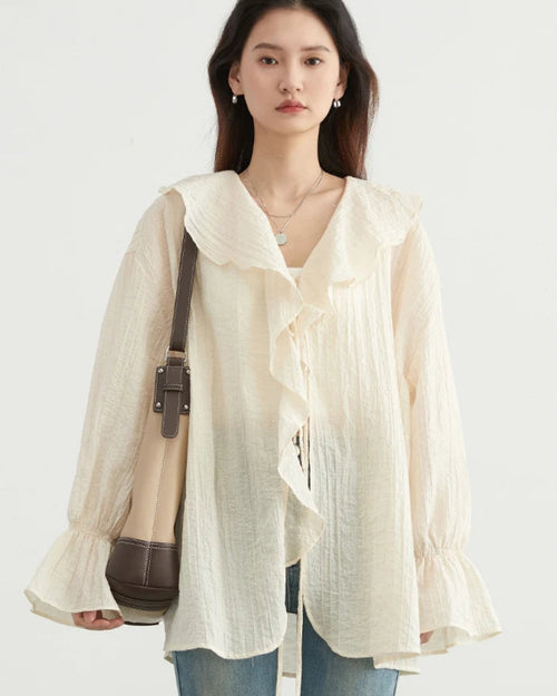 Effortlessly chic loose blouse in breathable Lyocell-nylon blend.