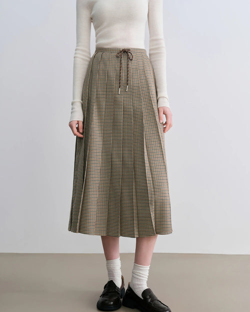 Women's coffee plaid pleated A-line skirt, featuring structured polyester-spandex fabric and classic gingham pattern for campus mornings or weekend outings elegance.