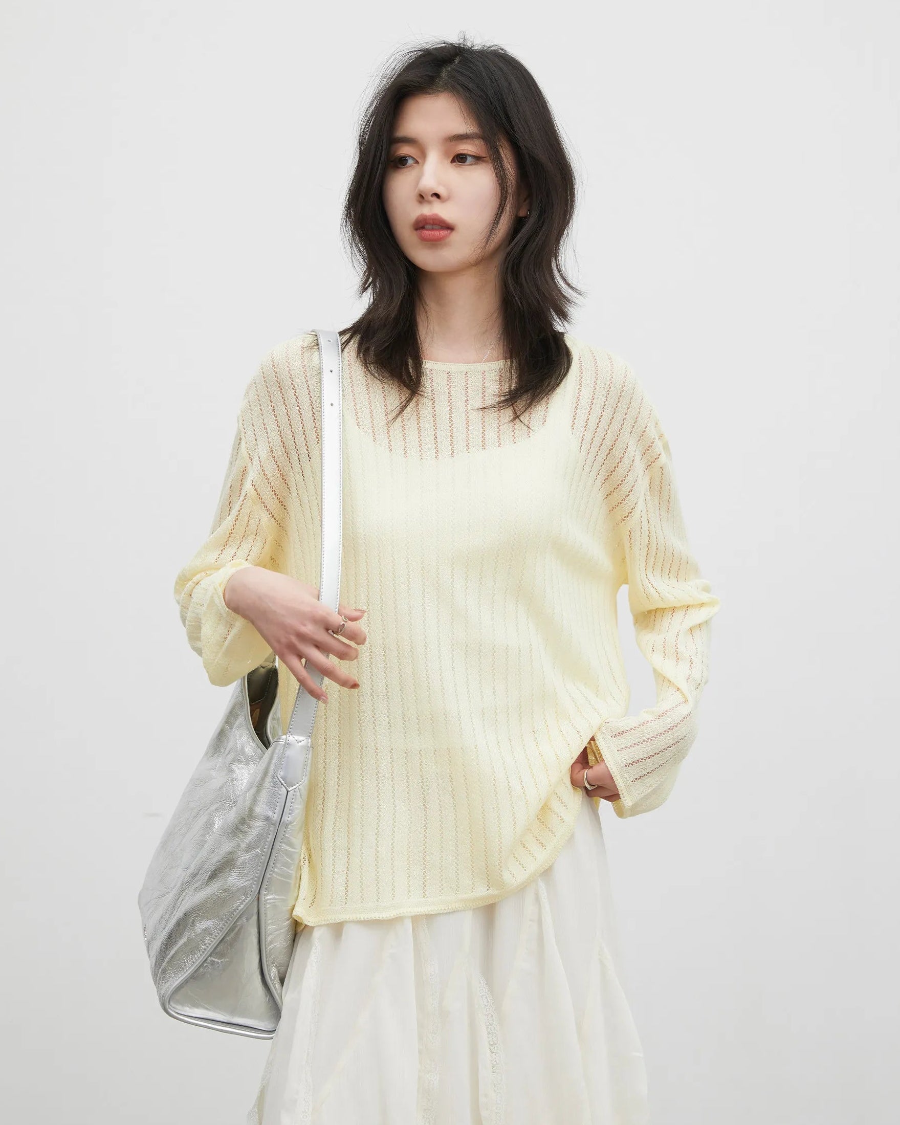 Hollow-Out Slant Shoulder Knit Top
